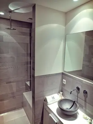 a bathroom with a sink and a shower at M-Square in Amsterdam
