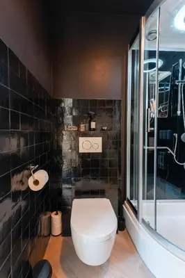 a bathroom with a toilet and a sink and a tub at The Gentle Arch Schiphol Amsterdam in Aalsmeer