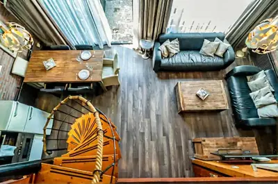 a living room with a couch and a table at Spacious Nature Escape, house for 6 near Amsterdam & Sea in Opmeer