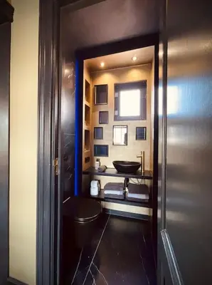 a bathroom with a toilet and a sink at City Apartment With Canalview at Canalhouse-Majestic in Utrecht
