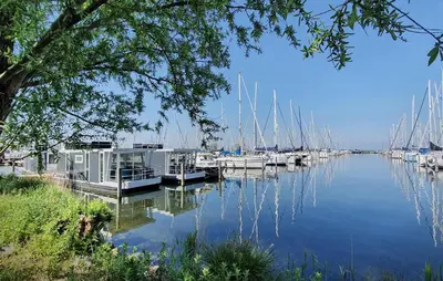 a group of boats docked at a marina at Jack Sparrow in Almere