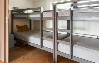 a couple of bunk beds in a room at Beautiful Home In Loosdrecht With Wifi in Loosdrecht