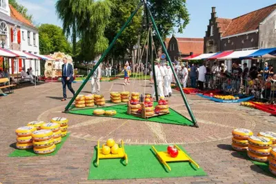 a display of fruits and vegetables at an outdoor market at Houseboat Oslo perfect voor bezoek Amsterdam in Monnickendam