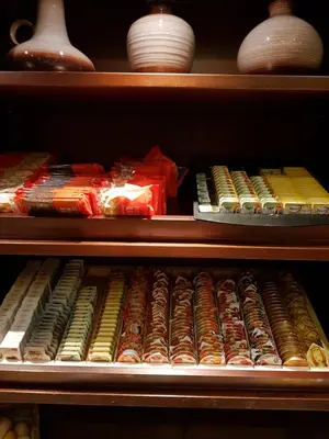 a shelf filled with lots of different types of food at Hotel Zee en Duin in Katwijk