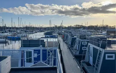 a bunch of boats docked in a marina at Trancoso in Naarden