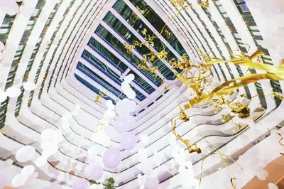 a rendering of a building with white and gold decorations at Hilton Amsterdam Airport Schiphol in Schiphol