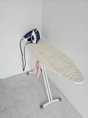 a bench with a bag sitting on top of it at Smile Home Wijk aan Zee 1 in Wijk aan Zee