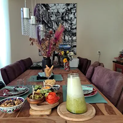 a dining room table with food on it at Cosy Apartment in Hilversum in Hilversum