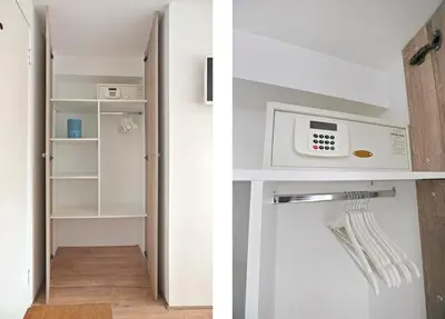 a kitchen with a microwave and a pantry at HouseBoat the New Lake - Nieuwe Meer in Amsterdam
