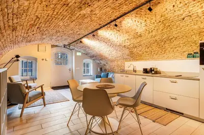 a kitchen and dining room with a table and chairs at 2 Luxurious canal apartments in Utrecht in Utrecht