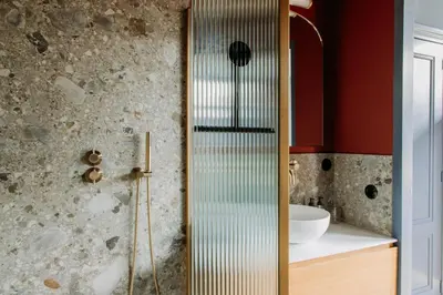 a bathroom with a shower and a sink at LeLou in Utrecht