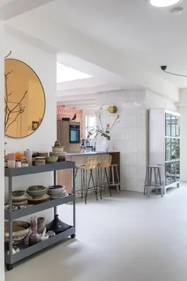 a kitchen with a table with dishes on it at Villa Magnolia in Bergen