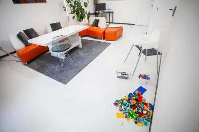 an overhead view of a living room with a table and chairs at Modern Central Leiden Family Apt - Sleeps 6 and Baby in Leiden