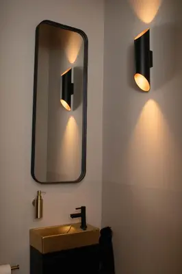 a bathroom with a sink and a mirror at Enjoy Heaven in Schellinkhout