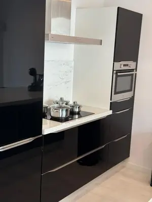 a kitchen with pots and pans on a stove at Gateway to Amsterdam in Almere