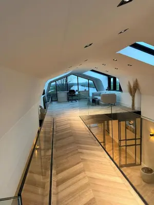a house with a glass ceiling and a living room at Luxury Apartment near Amsterdam in Purmerland