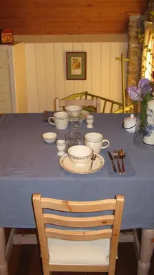 a blue table with cups and saucers on it at Droomgaerd in Vlist