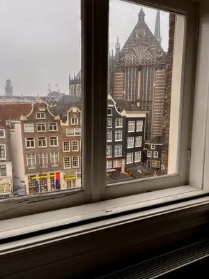 a view of a city from a window at New V Luxury Apartment in Amsterdam