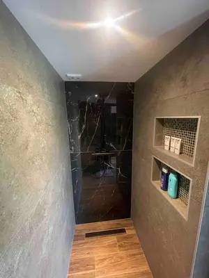 a bathroom with a walk in shower in a room at Unique Lodge 22 min from Amsterdam CS in Westzaan