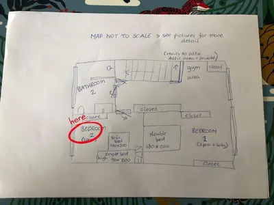 a drawing of a floor plan on a piece of paper at Family beach house in Egmond aan Zee