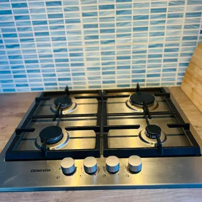 a stove top with four burners on top of it at Nice chalet near Reeuwijkse plassen in Reeuwijk