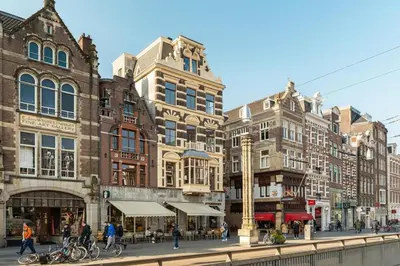 a group of buildings on a city street at Appartement Rokin in Amsterdam