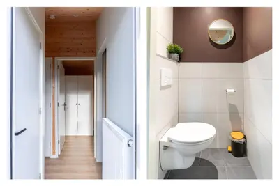 a bathroom with a toilet and a hallway at Rekerlanden 260 in Schoorldam