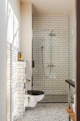 a bathroom with a toilet and a shower at Metzlr House in Haarlem