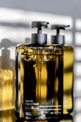 a close up of two soap dispensers on a counter at Metzlr House in Haarlem