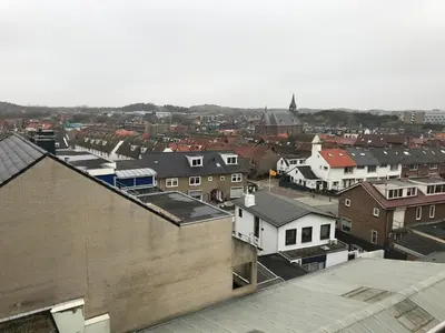 an aerial view of a city with houses and buildings at Zonnehoek 77 in Egmond aan Zee