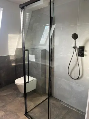 a bathroom with a shower and a toilet at The Lighthouse in Egmond aan Zee