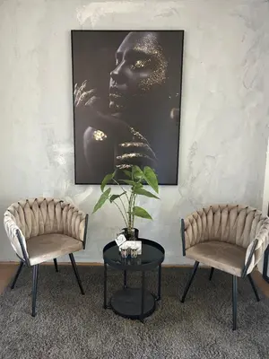 a living room with two chairs and a table at Saya Loft in Amersfoort