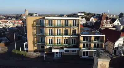 an aerial view of a building in a city at Victor hotel in Noordwijk