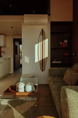 a living room with a couch and a coffee table at Venti Beach Houses in Zandvoort