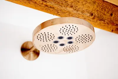 a metal shower head attached to a ceiling at By Tons Huisje inclusief twee fietsen in Zegveld