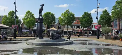 a fountain in a city with a statue of animals at Guesthouse Purmerend near Amsterdam Volendam in Purmerend