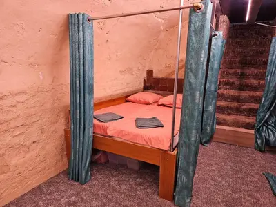 a bedroom with a bunk bed in a room at Overnachten aan de Werf in Utrecht