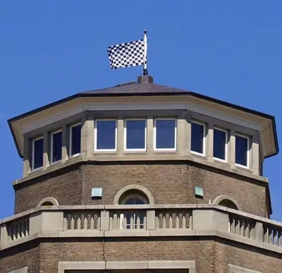 a building with a flag on top of it at Beachstudio in Zandvoort