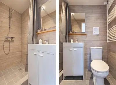 a bathroom with a toilet and a sink and a shower at Beachstudio in Zandvoort