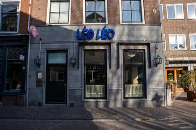 a store front of a building with a sign on it at Léo Léo in Utrecht