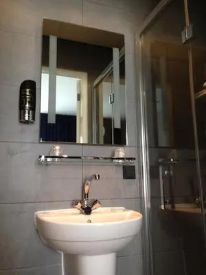 a bathroom with a sink and a shower at B&B House No 7 in Amsterdam