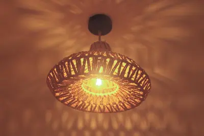 a ceiling light that is hanging from a wall at Juneberry Ecolodge Bergen in Bergen
