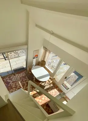 an overhead view of a living room with a white table at Holiday home close to beach and Keukenhof in Noordwijkerhout