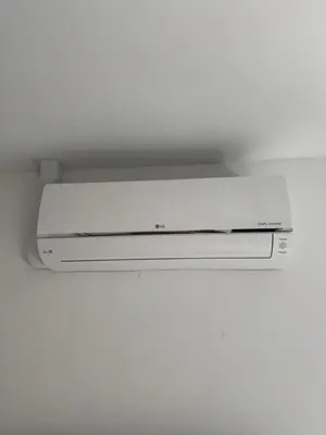 a dvd player sitting on top of a ceiling at Smile home 3 Wormerveer- Zaanse Schans en Amsterdam appartements in Wormerveer