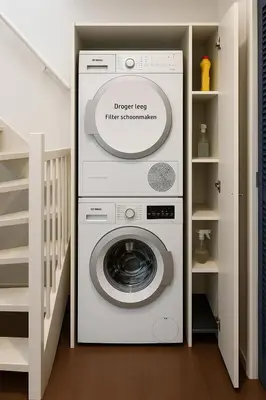 a washer and dryer in a small room at Reza Almere in Almere
