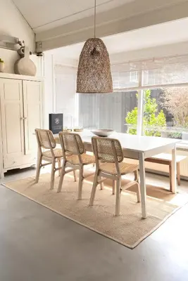 a dining room with a white table and chairs at -Casa Como- nabij het meer, restaurants & keukenhof in Noordwijkerhout