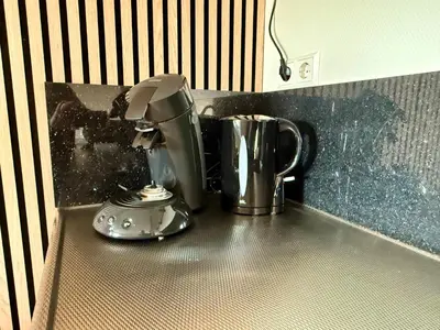 a kitchen counter with a mixer and a coffee pot at Holiday Home Vijfhuizen 2pers Lisa in Vijfhuizen