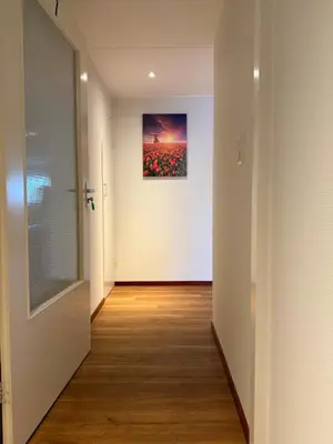 an empty hallway with a painting on the wall at Holiday Home Vijfhuizen 2pers Lisa in Vijfhuizen