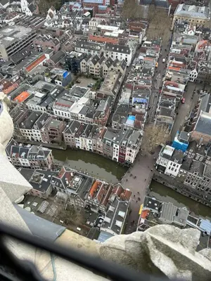 an aerial view of a city with a river and buildings at Domnacht aan de gracht in Utrecht