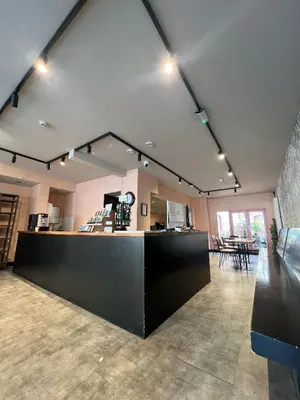 a large room with a counter in the middle at Amigo Hotel in Amsterdam